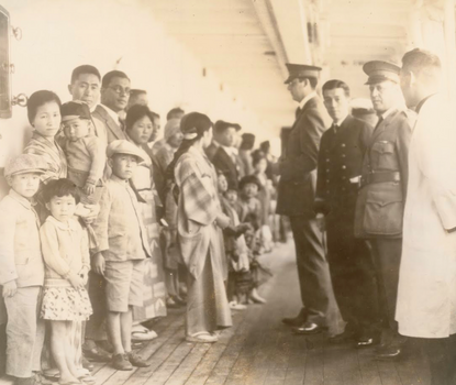 Immigrants aboard the Shimyo Maru at Angel Island, California.