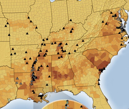 Detail from a multicolored map depicting enslaved population by county in the South, along with government farms and camps set up by the Union Army during the Civil War.