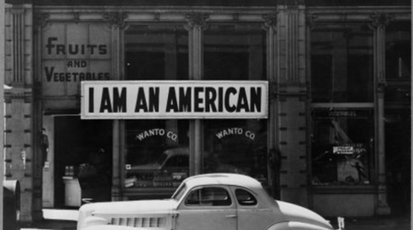 "I Am an American" sign in shop window, Oakland, CA, March 1942, photography by Dorothea Lange (Library of Congress)