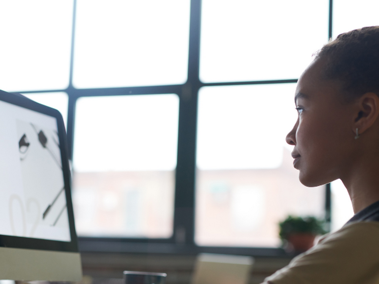 Engaged Student Viewing a Computer Screen