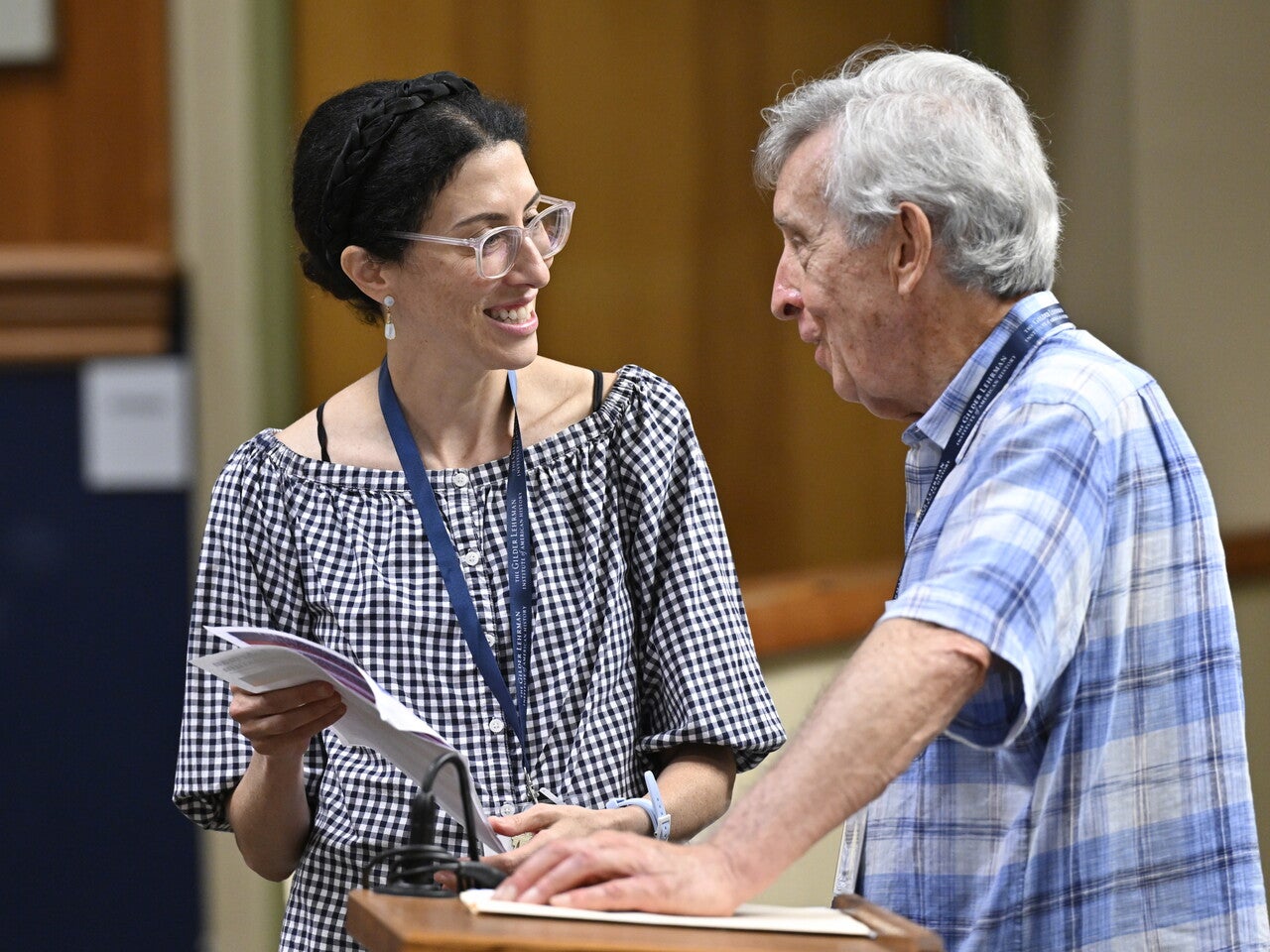 Teacher and professor in conversation at summer PD