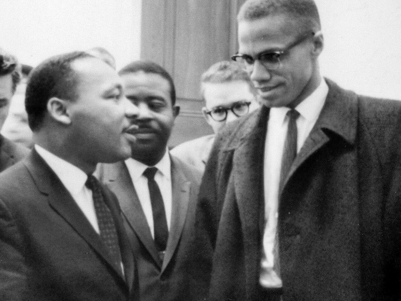 Martin Luther King and Malcolm X after King's press conference at the U.S. Capitol about the Senate debate on the Civil Rights Act of 1964