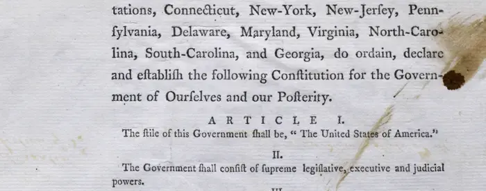 View of rare first printing of the Constitution with notes by Pierce Butler, focused on the preamble