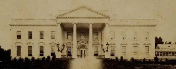 Black and white photograph of the White House from the North Lawn, from 1881