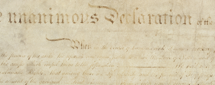 Engrossed copy of the Declaration of Independence focused on word Declaration