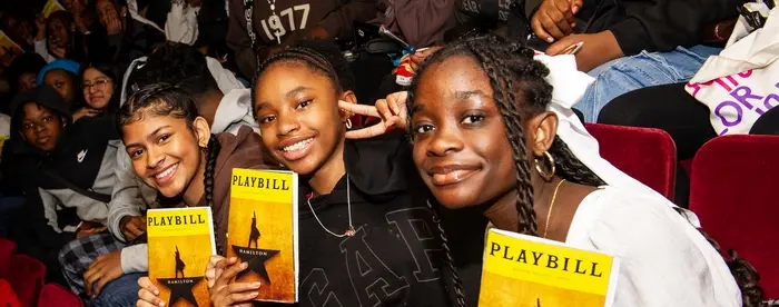 Students attend a performance of Hamilton on Broadway.