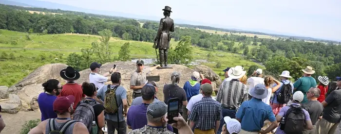 Teachers on a guided tour of Little Round Top at Gettysburg National Military Park.