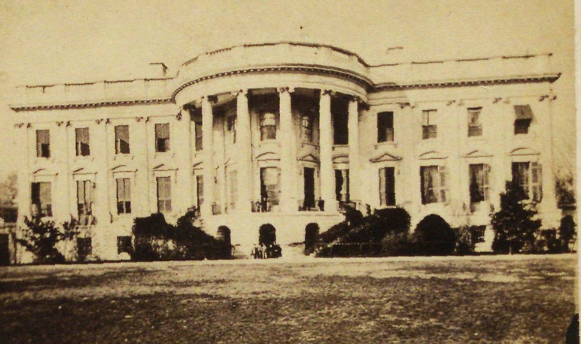 Black and white photograph showing the rear view of the White House, taken ca. 1860