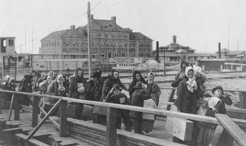 Line of immigrants landing at Ellis Island, 1902