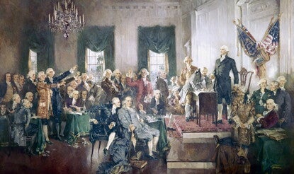 A painting depicting the signing of the Constitution.