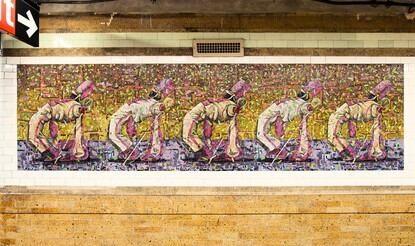 A tile mosaic in a subway station of drum majors in white uniforms dancing in formation.