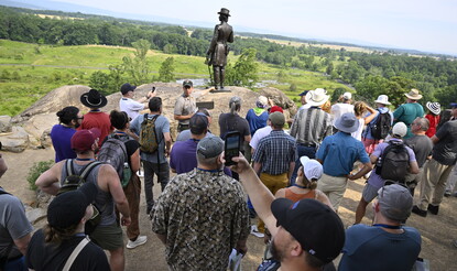 Teachers on a guided tour of Little Round Top at Gettysburg National Military Park.
