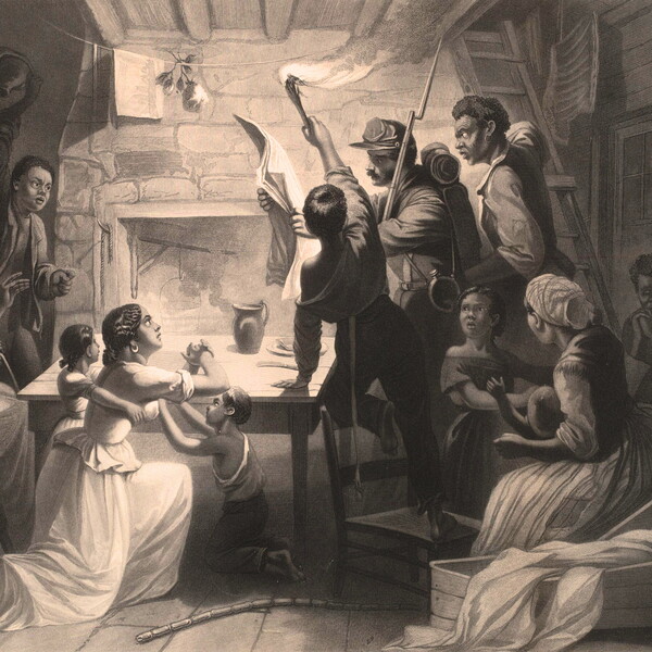 Black and white print of Black men, women, and children reading the news of their emancipation.