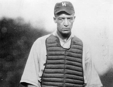  Black-and-white photograph of Louis Santop Loftin in the gear of a catcher.