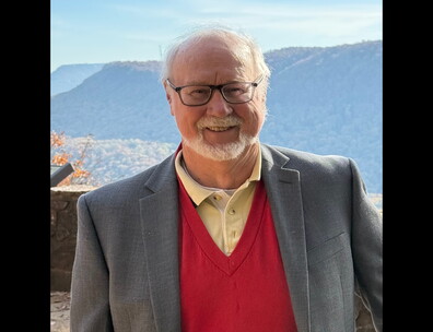 A headshot of author A. Wilson Greene.