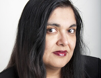 A headshot of Sinha Manisha.