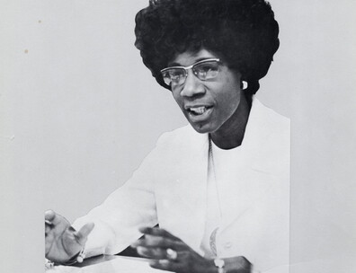 A portion of a campaign poster for Shirley Chisholm.
