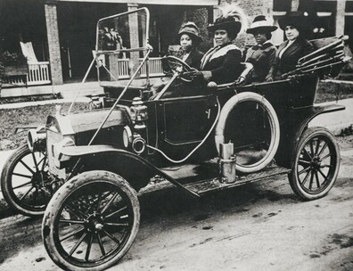 Madam C. J. Walker, driving, with (left to right) niece Anjetta Breedlove, factory forelady Alice Kelly, and bookkeeper Lucy Flint, ca. 1911 (Schomburg Center for Research in Black Culture, New York Public Library)