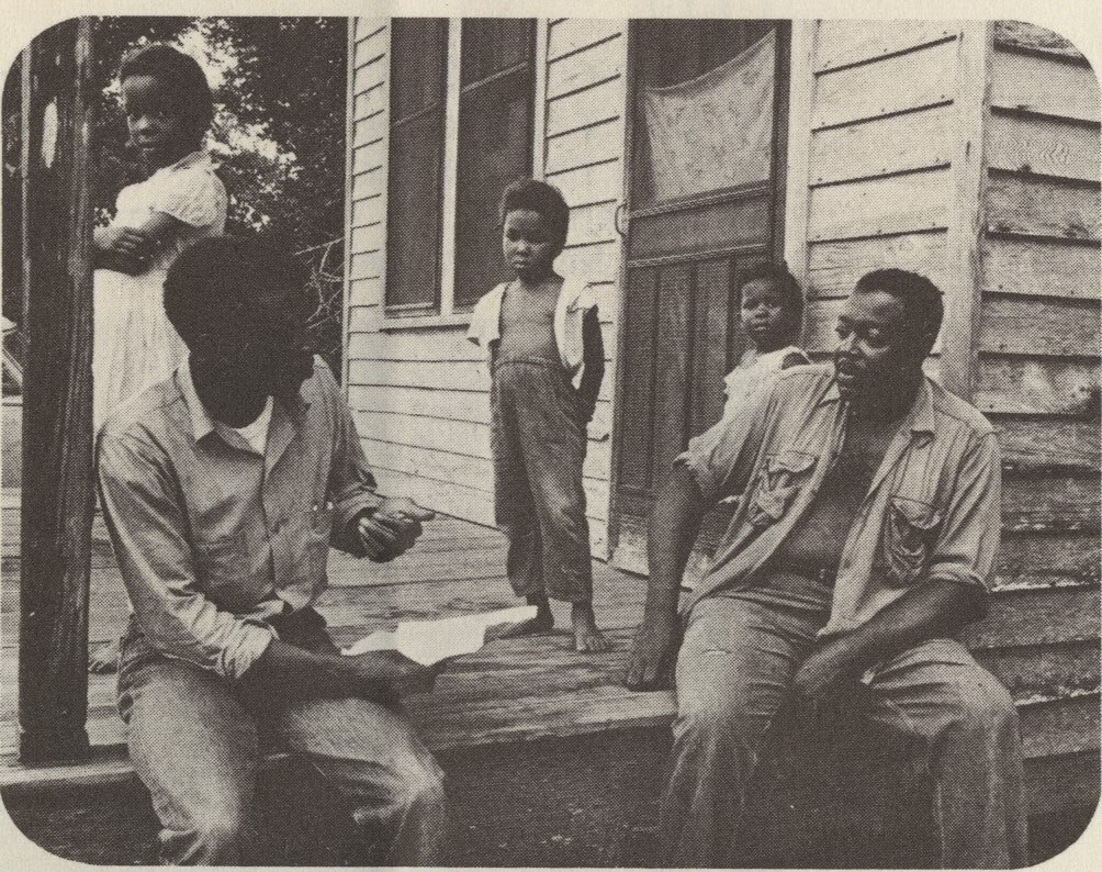 CORE task force worker Daniel Mitchell interviews a prospective registrant, 1962.