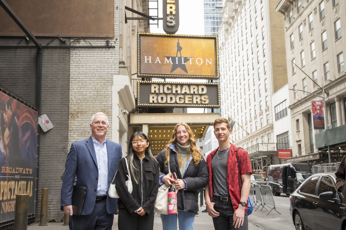 Marist Dean of the School of Liberal Arts Martin Shaffer and McCormick Family Foundation-Gilder Lehrman Scholars Elisabet Guerrero Hernandez '25, Olivia Korach '26, and Ethan Roy '26 stand outside the Richard Rodgers Theater ahead of a matinee performance of Hamilton.