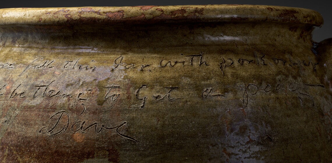 Close View of the Inscription on the Stoneware Jar