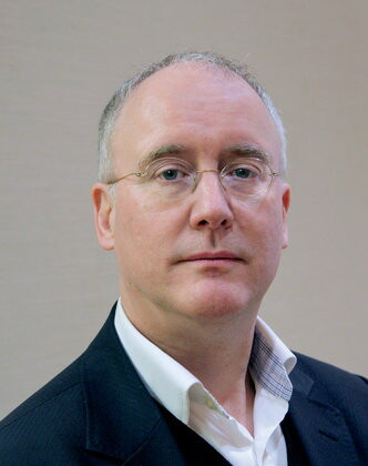 A headshot of David Armitage.