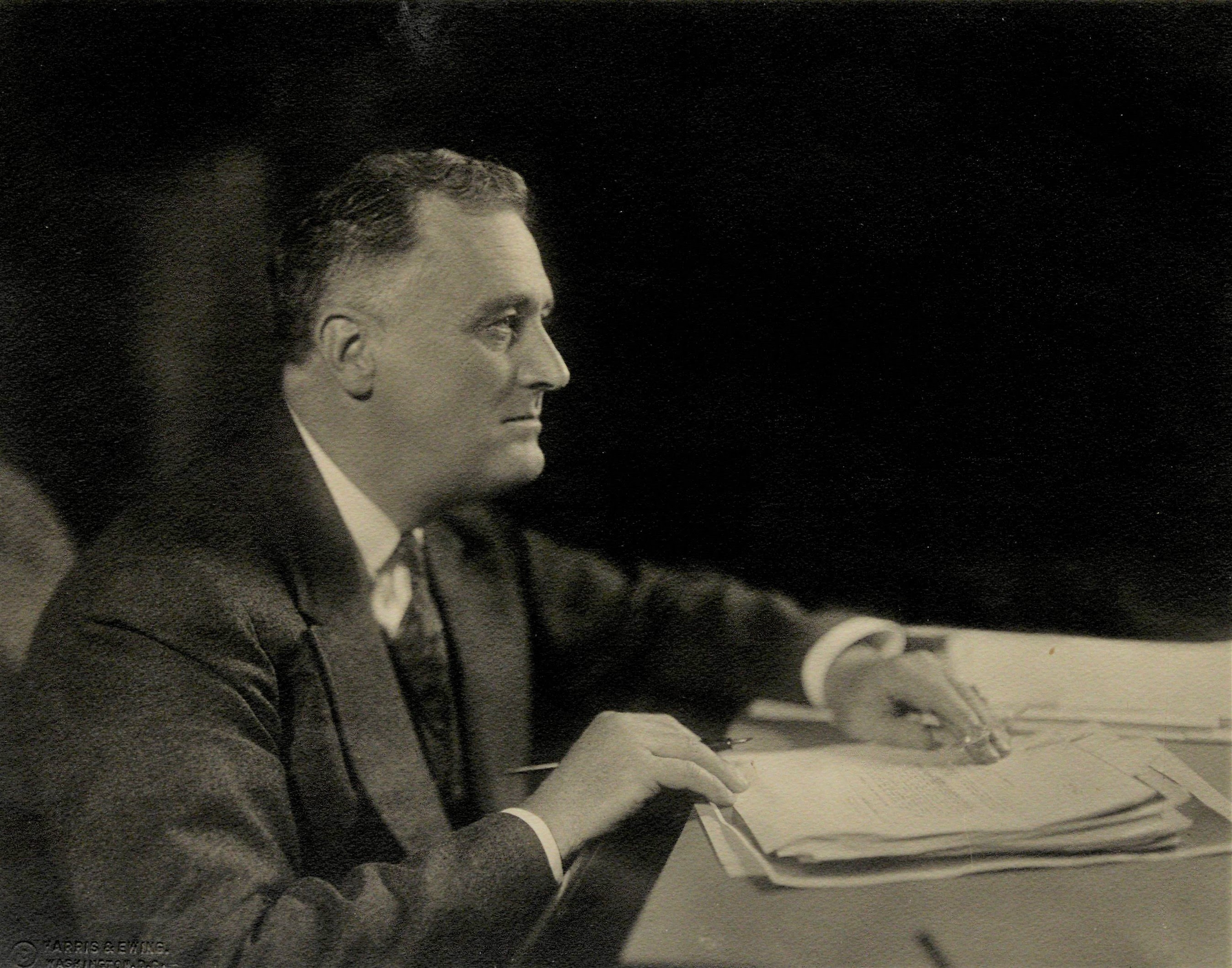 Franklin Roosevelt signing a document, ca. 1935 (Gilder Lehrman Institute, GLC04675.06)